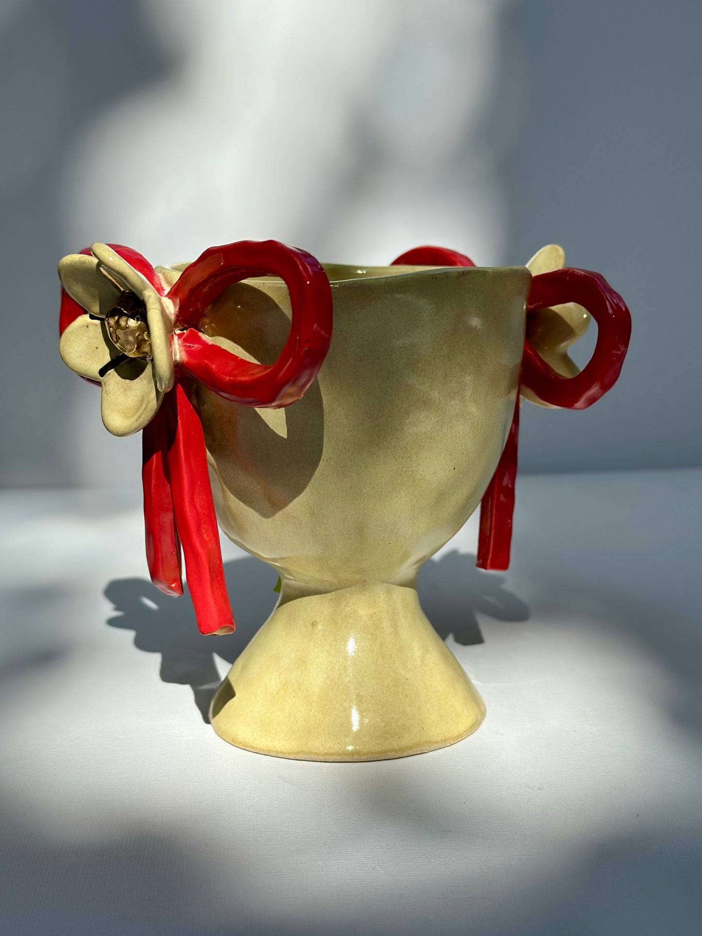 Daisy, Yellow Trophy with Red Bows