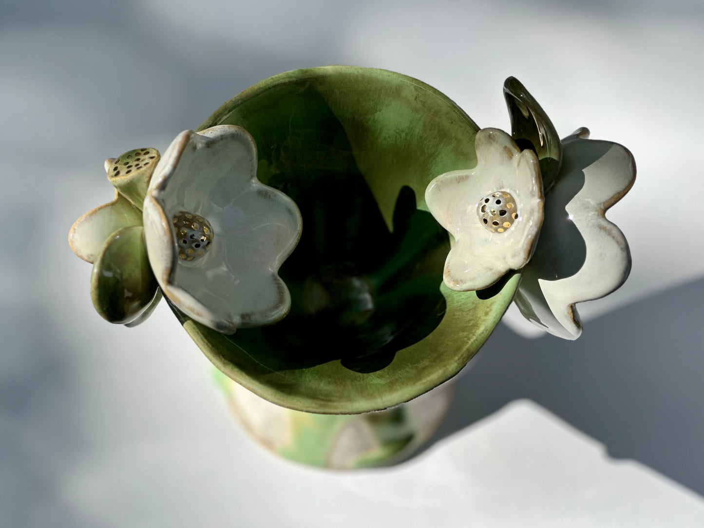 Gemma, Falling Green Trophy with White Blooms