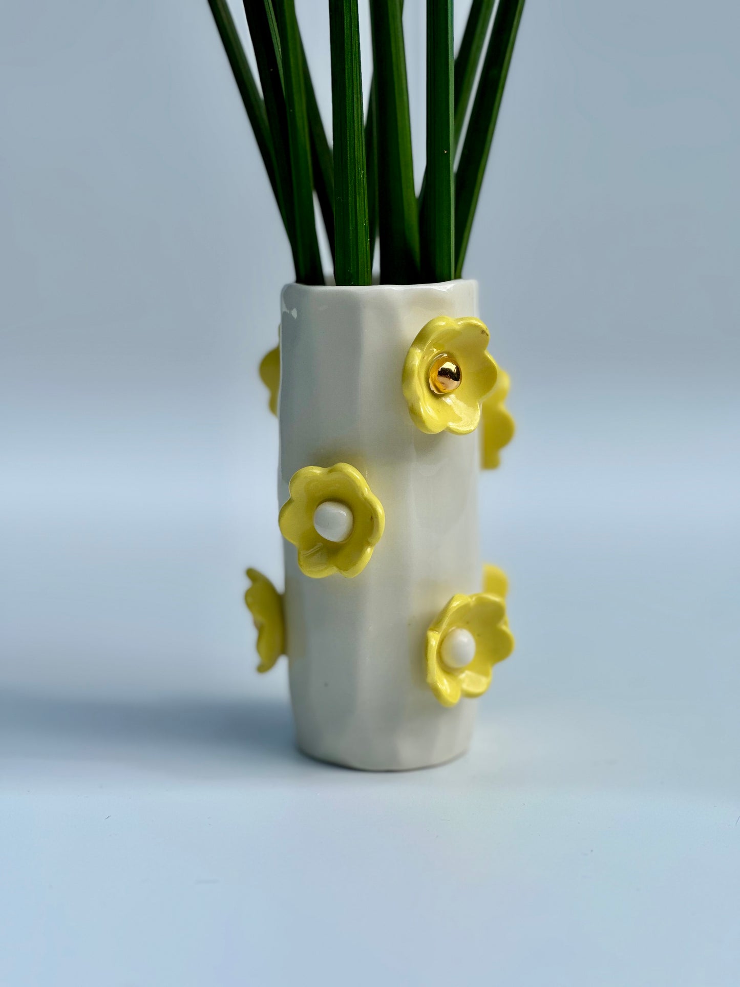 White Porcelain Vase with Daisy Yellow Flowers