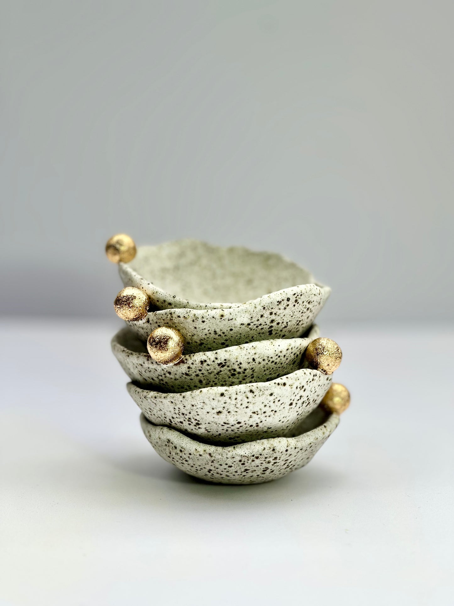 Speckled Dish with Gold Bauble