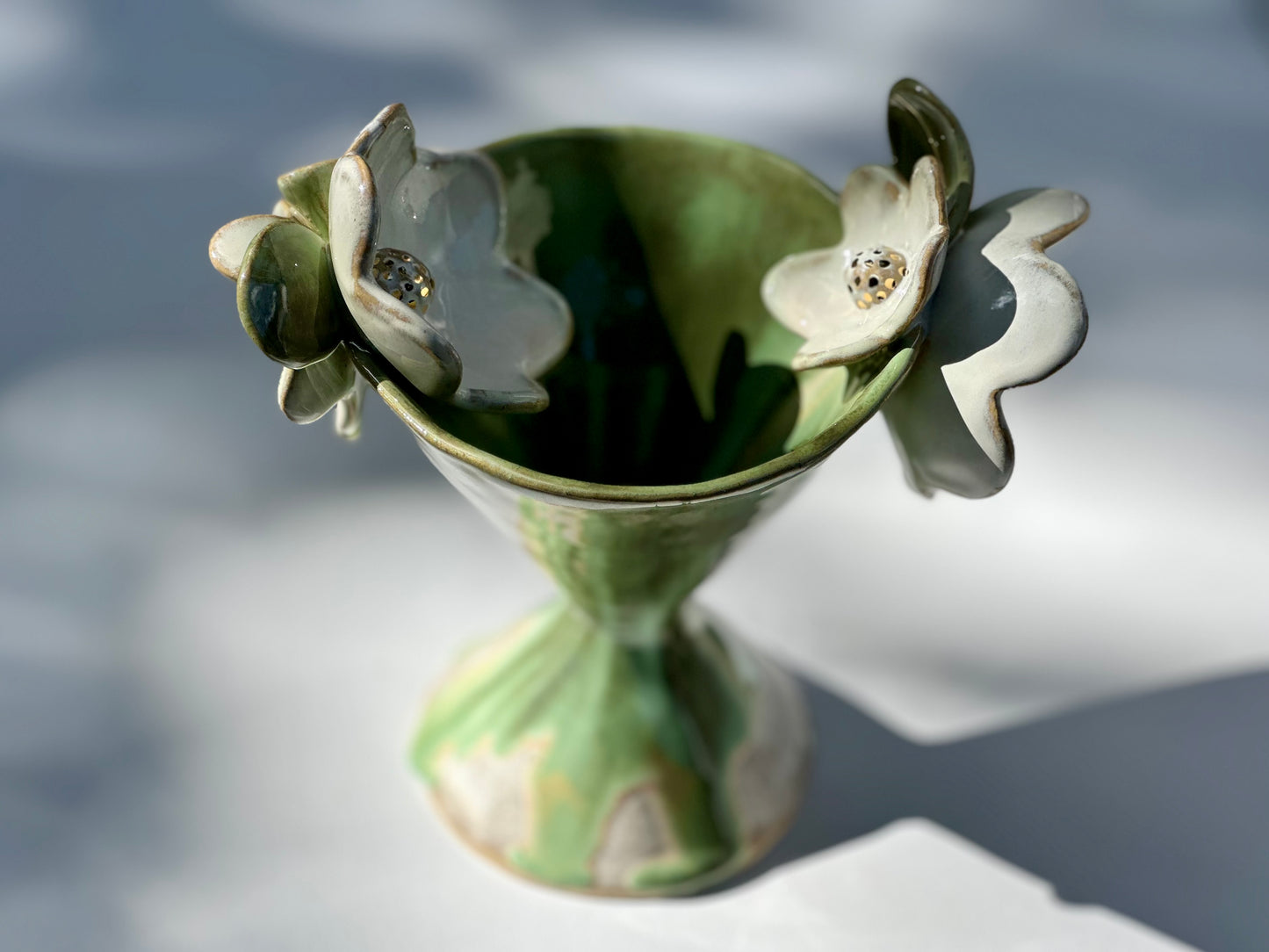 Gemma, Falling Green Trophy with White Blooms